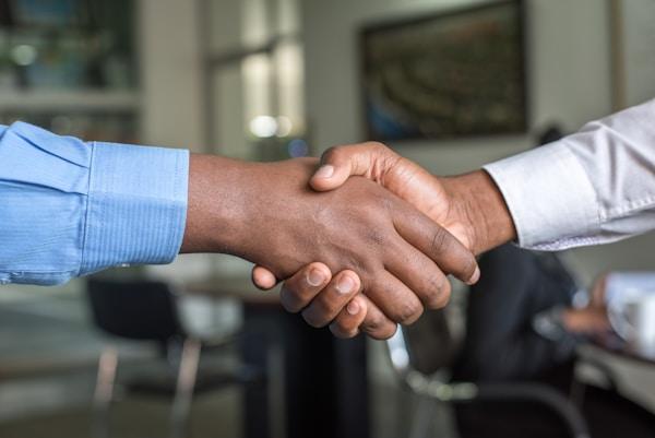 What does a title insurance agent do